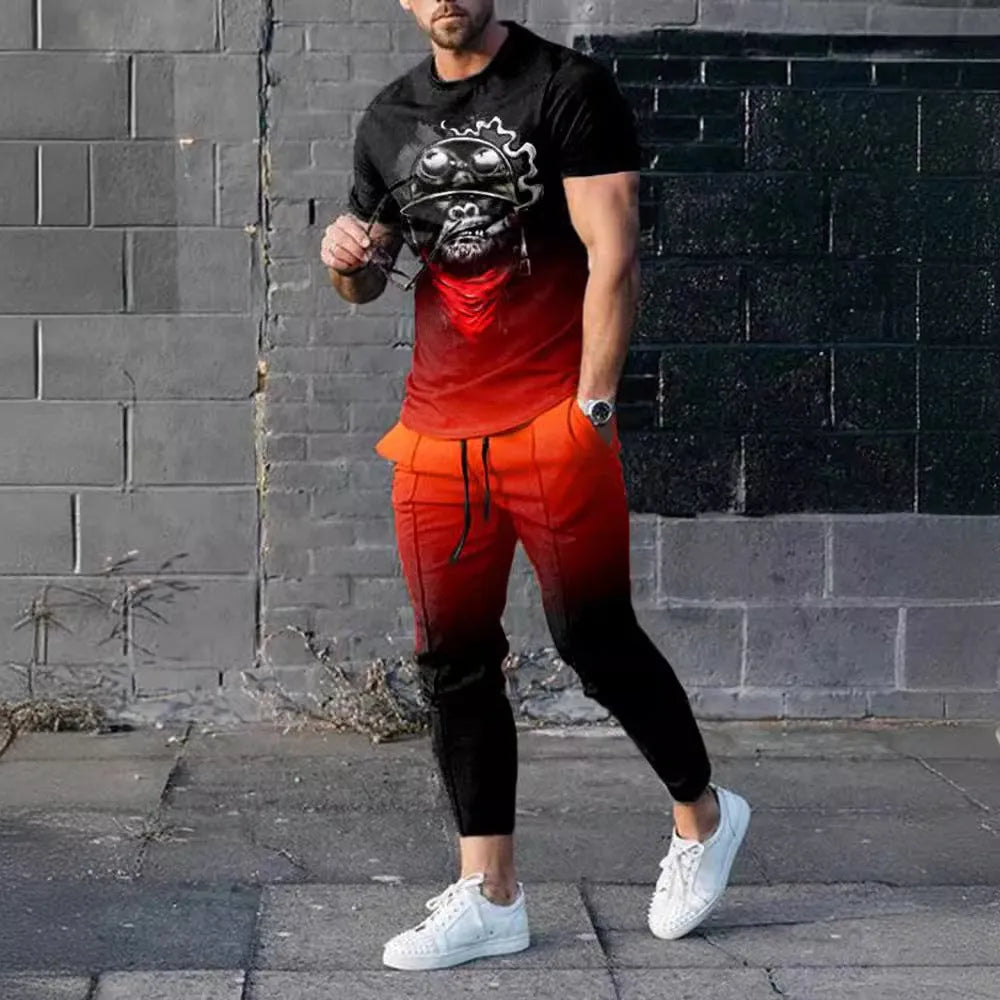 Man wearing a short sleeve printed pullover and matching trousers from a men's two-piece sports set.