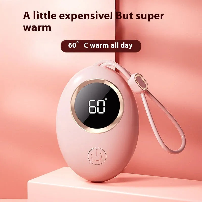 Compact USB rechargeable hand warmer power bank with digital display, shown in pink colour.