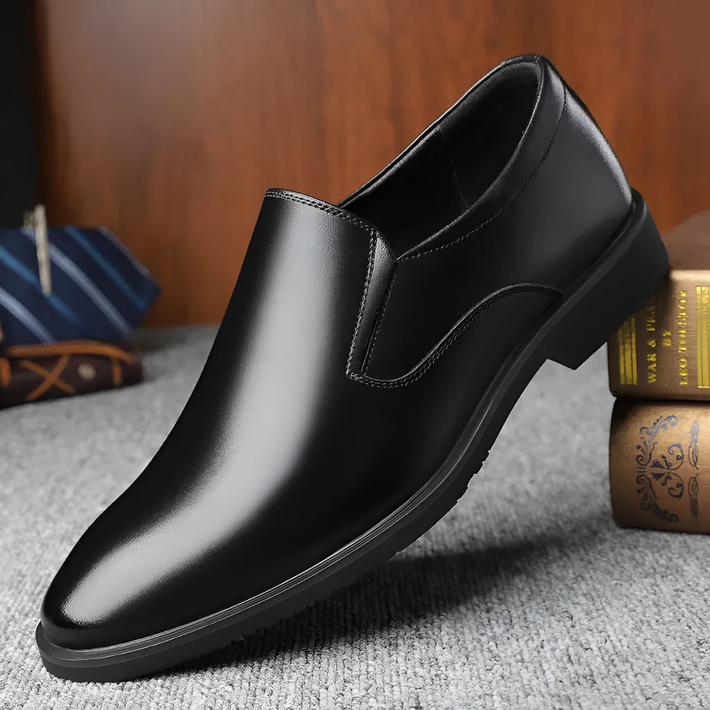 Men's black business casual slip-on shoes with leather uppers and rubber soles