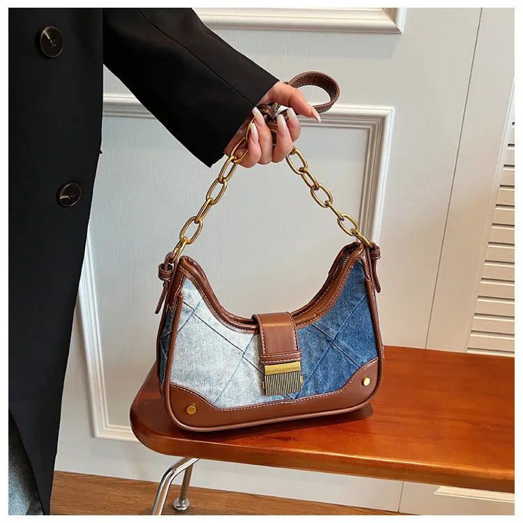 Brown soft denim women's bucket shoulder bag with diamond mesh and chain strap.