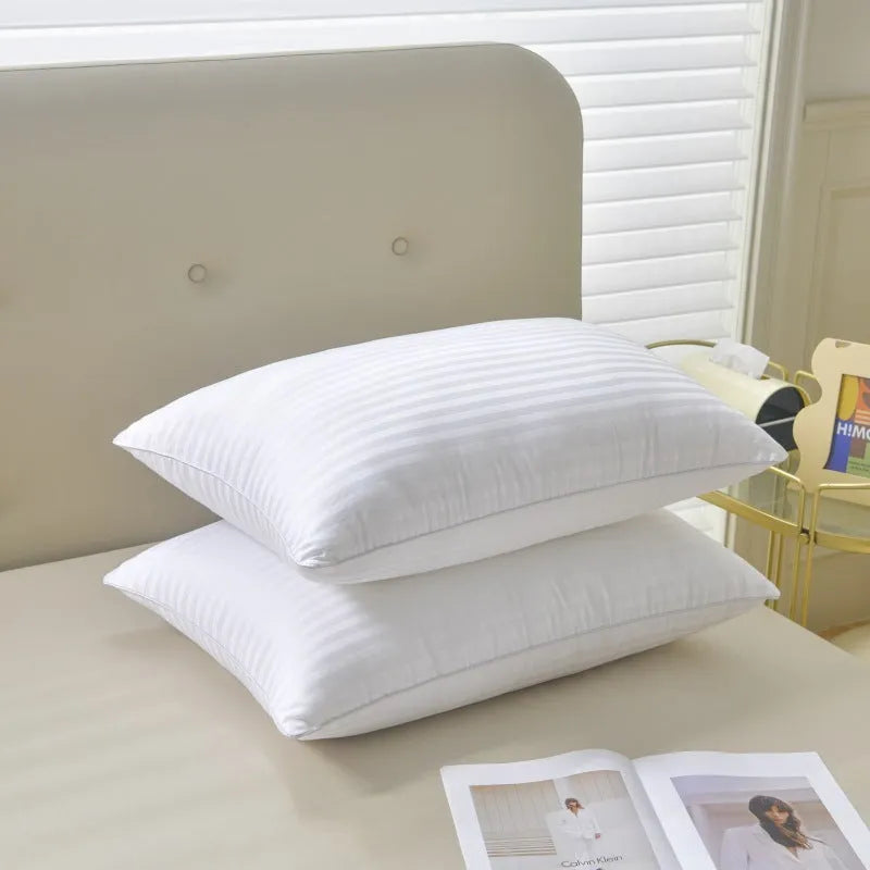 White hotel cotton satin stripe feather pillow showing 2cm stripe detail, shown in three sizes.