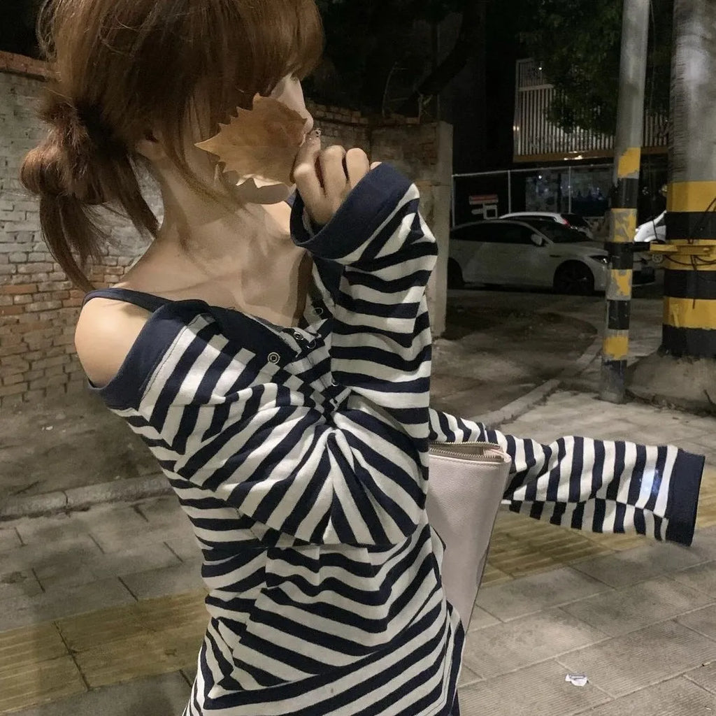Dark blue Korean-style oversized women's long-sleeved t-shirt with stripes and embroidery detail.