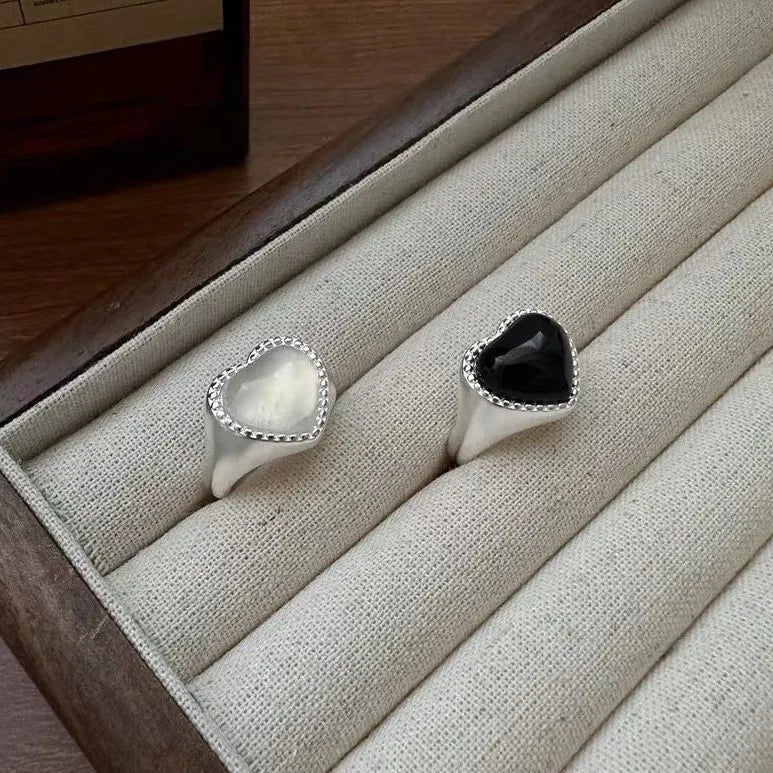 Adjustable heart-shaped sterling silver ring with black agate stone centrepiece
