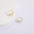 Geometric triangle birthstone ring with horse eye tricolour zircon in gold electroplated finish