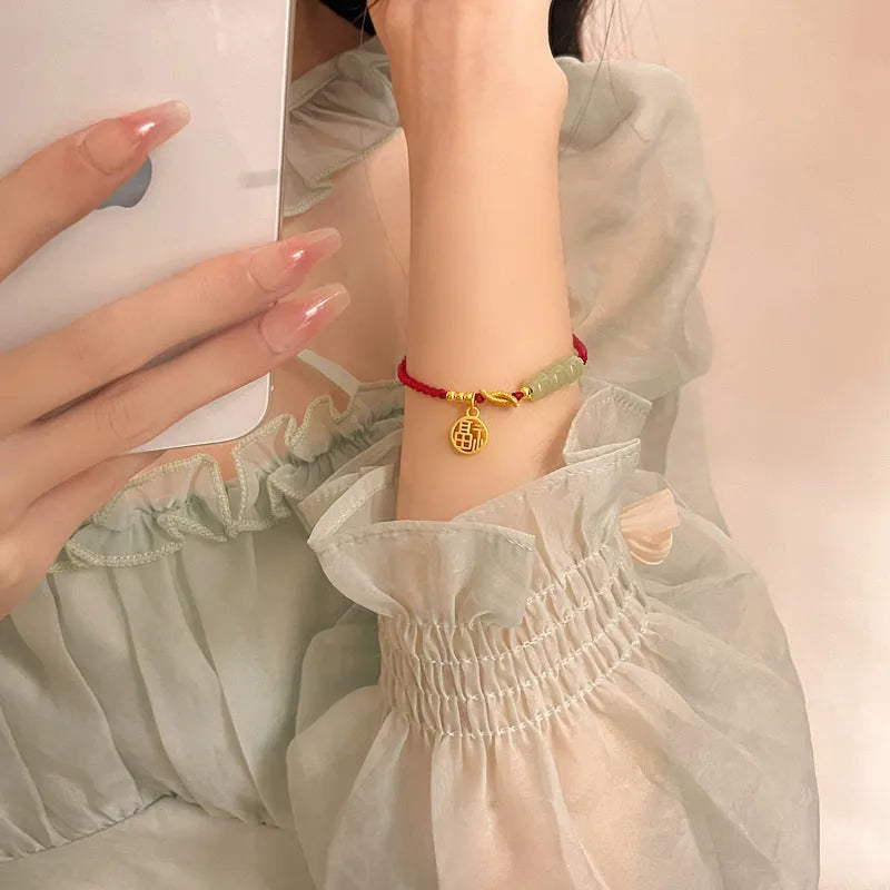 Red rope woven bracelet with copper-plated gold blessing card strap and Chinese character modelling for women.