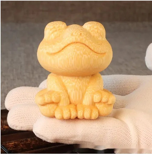 Solid bamboo carving ornament with smiling frog design measuring 5cm tall