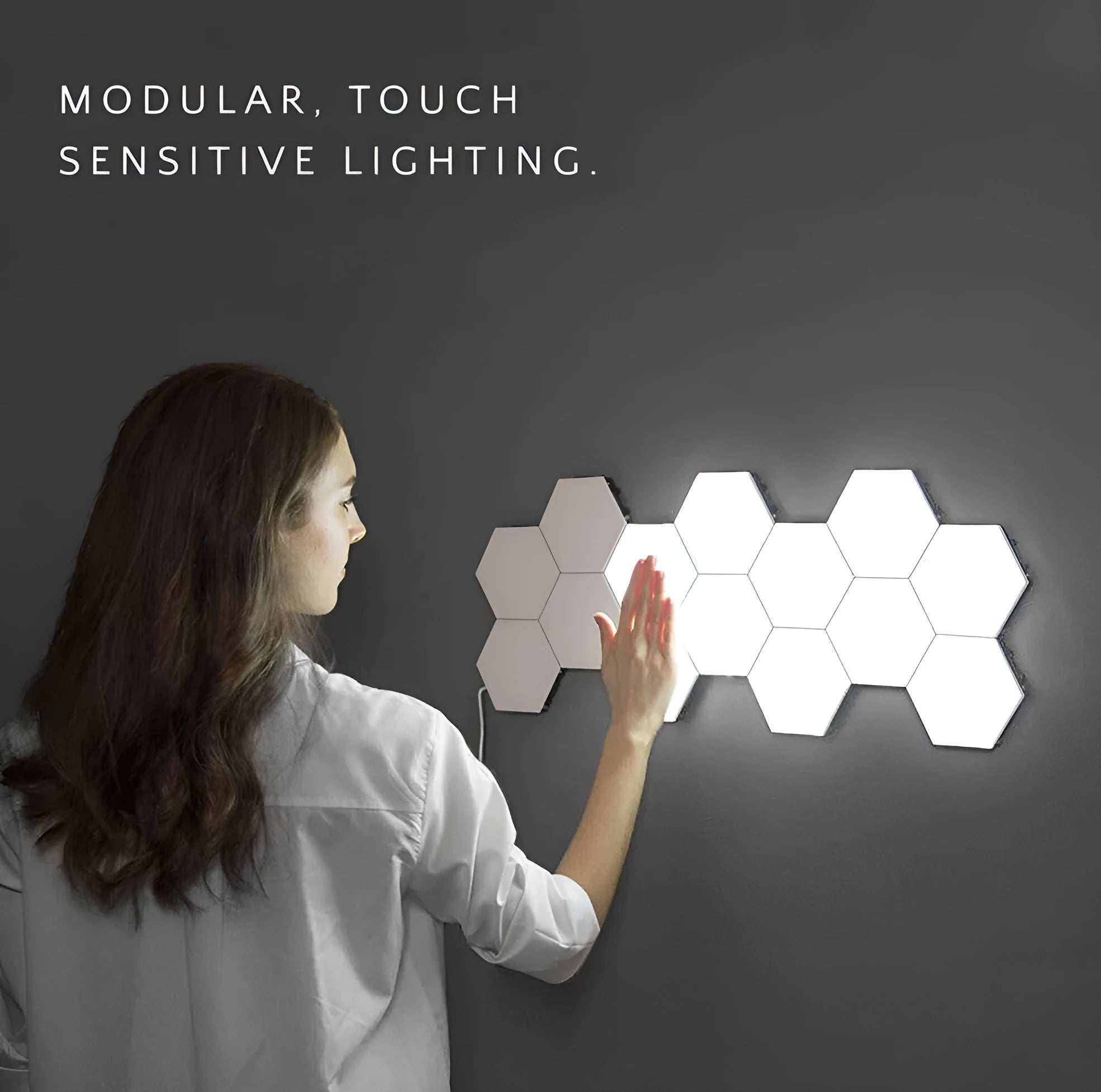 Helios modular honeycomb wall lamp with hexagonal panels in modern minimalist design