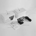 Black 8MP USB webcam with magnetic privacy cover on desktop