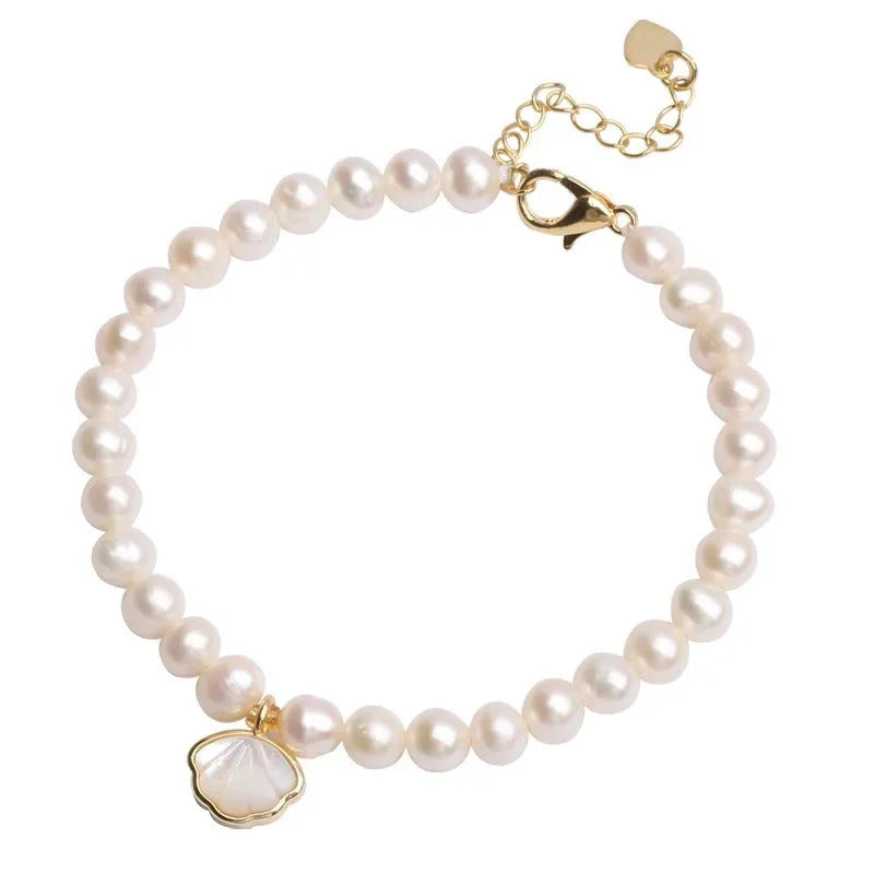 Women's freshwater pearl bracelet with fan-shaped design and alloy clasp, 16cm long.
