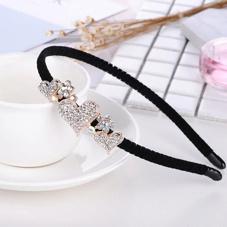 Rhinestone bow headband for women with metal alloy frame and three-dimensional flower decoration