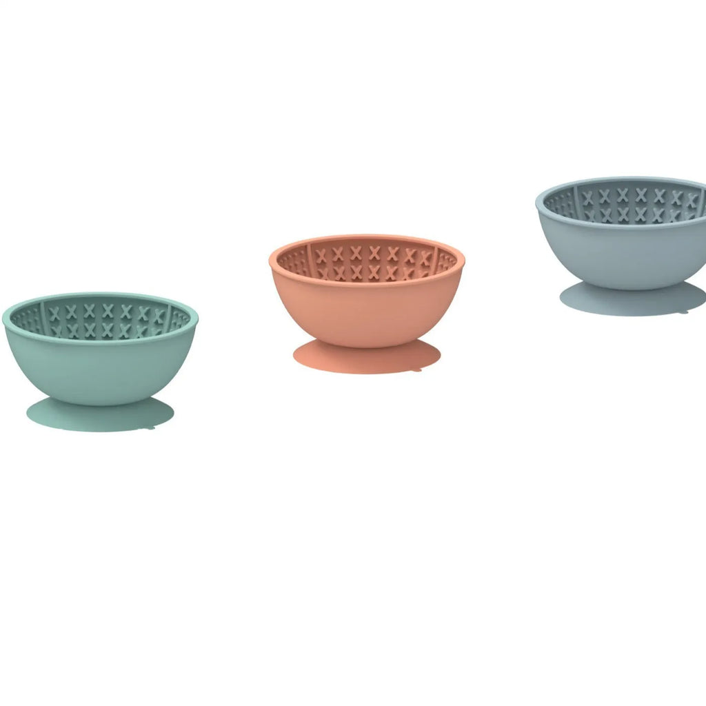 Cyan silicone dog slow feeder bowl with textured licking mat surface and suction cup base