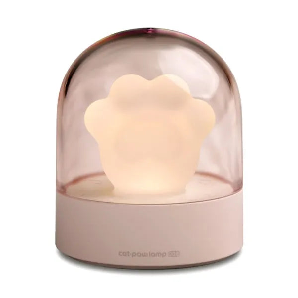 Grey and pink cat paw shaped night light with USB charging cable and musical rotation feature