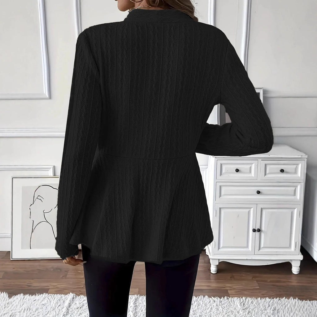 Women's apricot tight fit knitted cardigan with jacquard pattern and a single button.