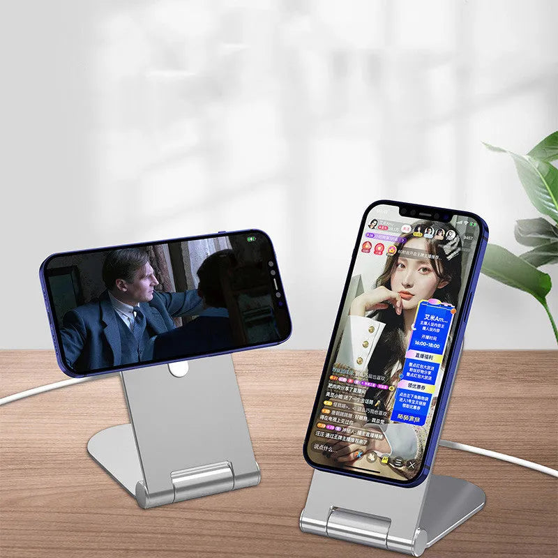 Silver vertical adjustable magnetic phone bracket for iPhone 12 on a desktop