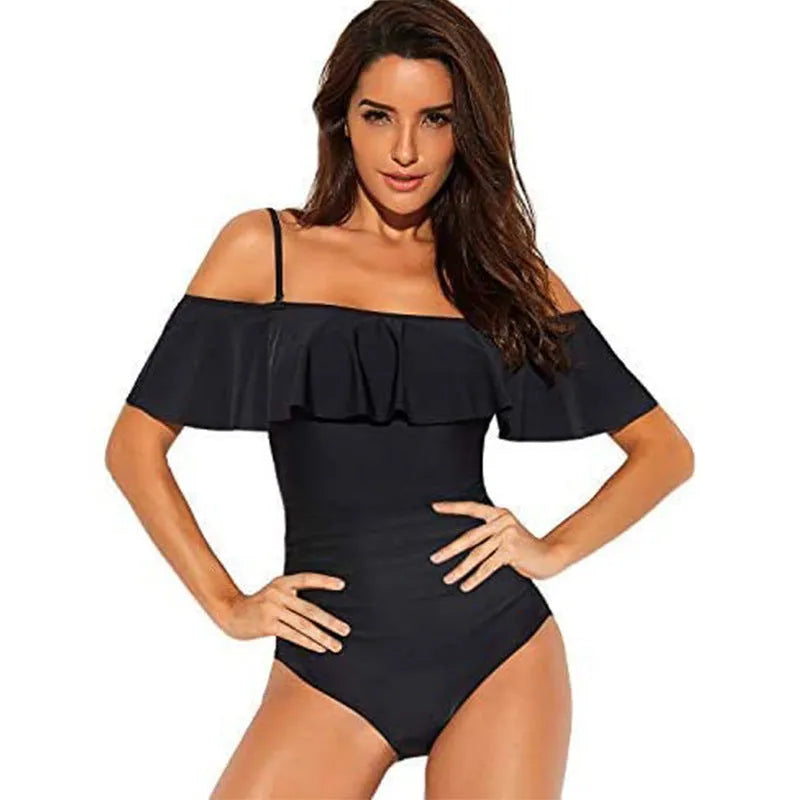 Black one-piece swimsuit with ruffled halter strap and side cut-out details