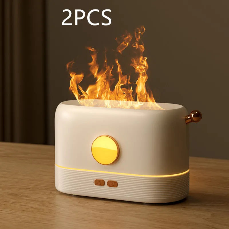 Black USB desktop humidifier with glowing simulated flame effect and water mist output.