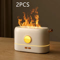 Black USB desktop humidifier with glowing simulated flame effect and water mist output.