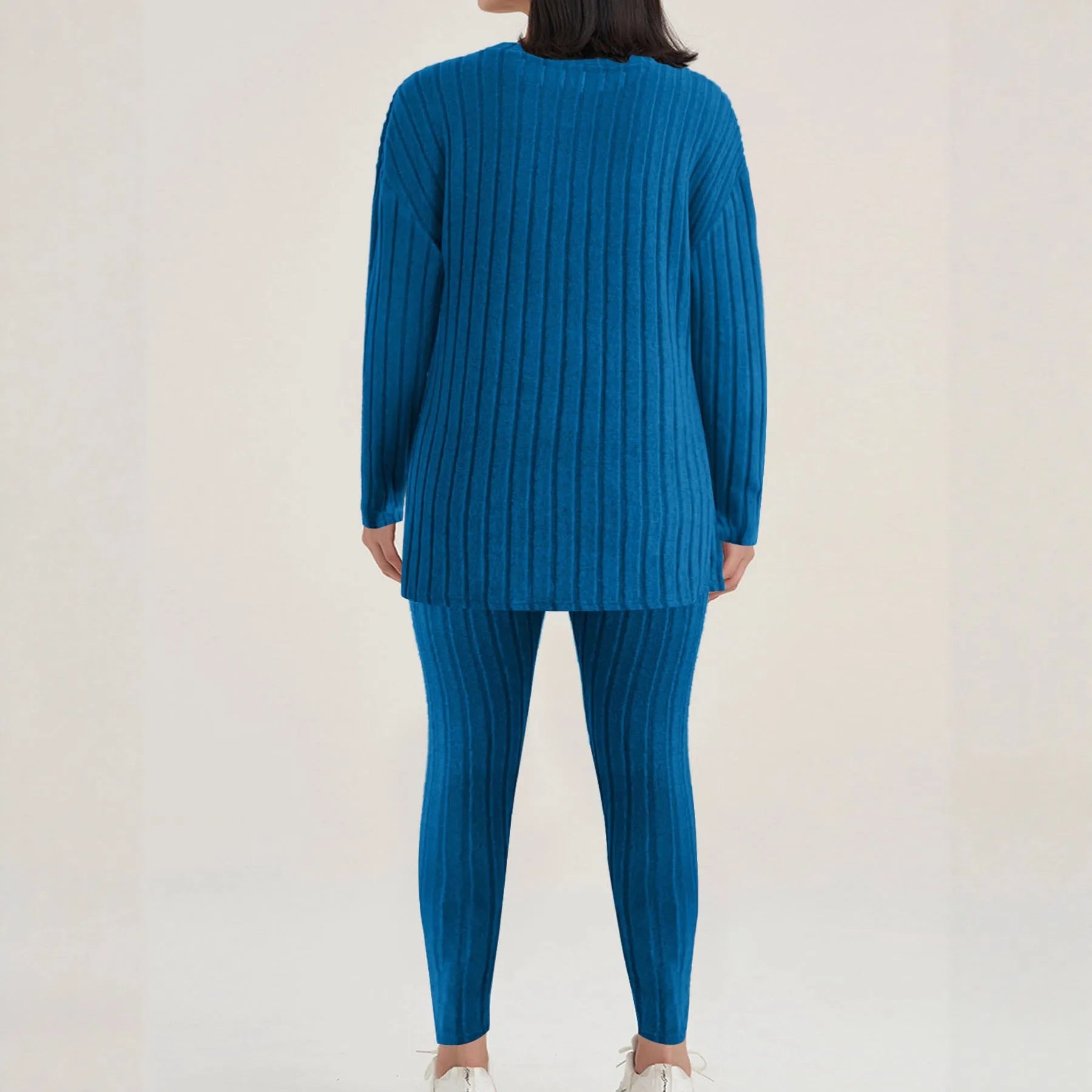 Black sunken stripe two-piece homewear set with pants and regular sleeve top on hanger