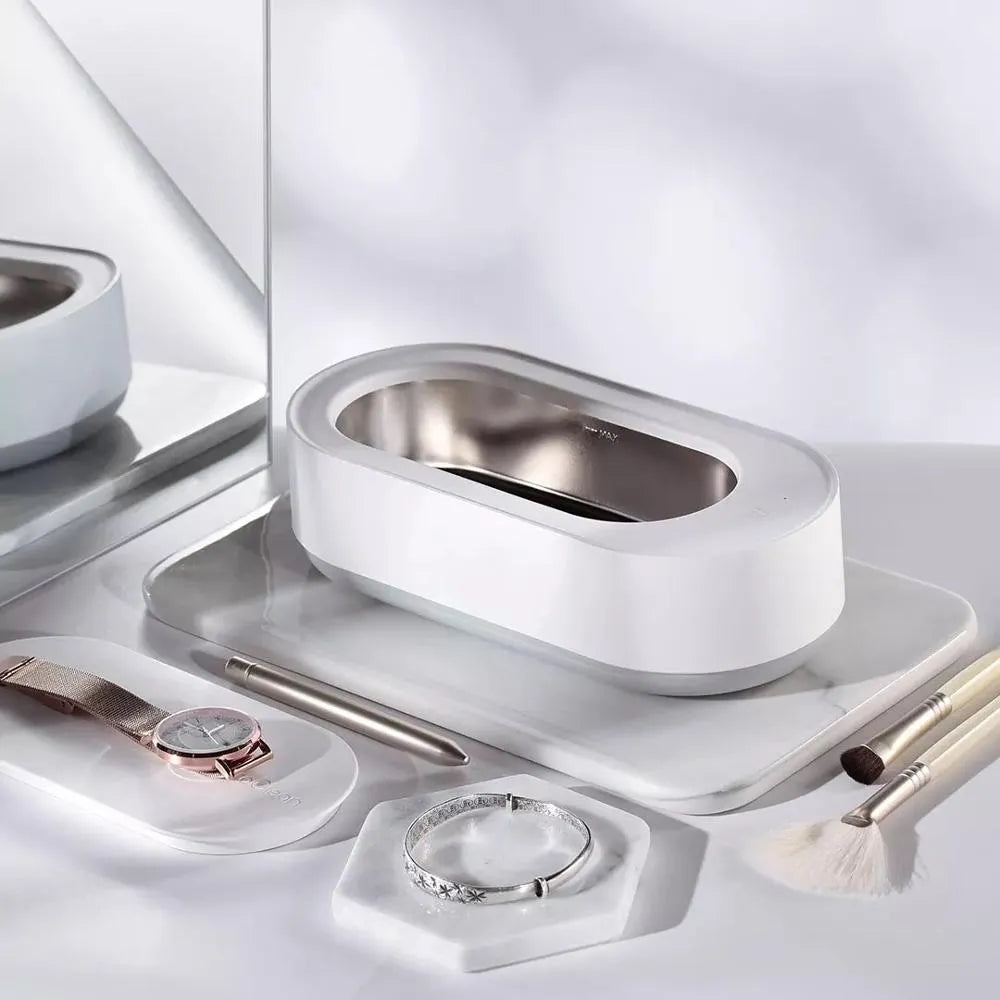 White portable ultrasonic cleaning machine with display and stainless steel tank.