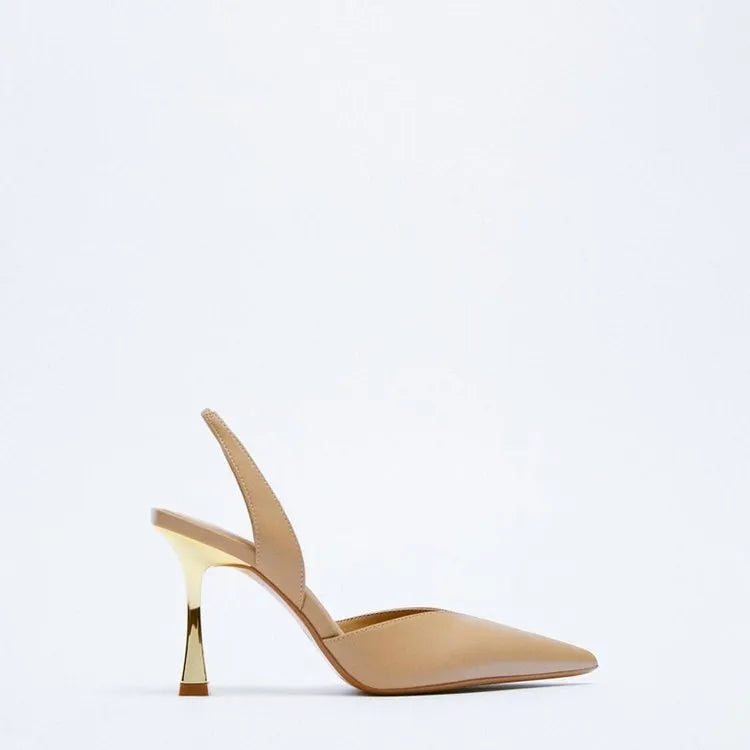 Women's pointed toe patent leather high heels in apricot nude colour, showing shallow mouth design.