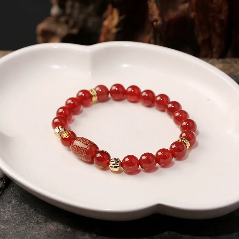A new Chinese style agate Guanyin bracelet rosary with auspicious patterns, shown in green and red colour options.