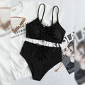 Black women's bikini swimsuit with sling split style and high waist shorts.