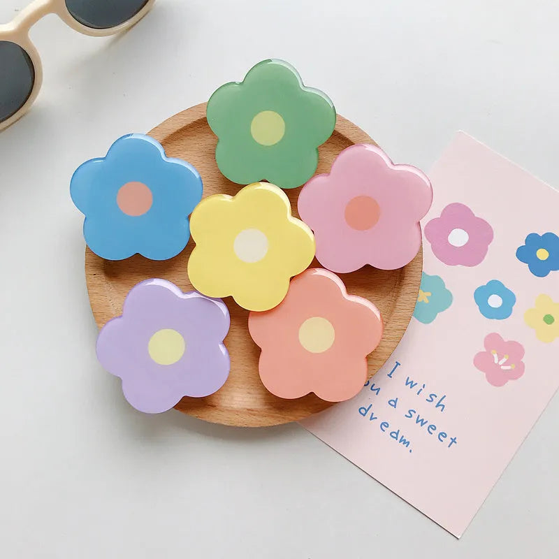 Plastic mobile phone airbag bracket desktop stand flower design colour options blue green orange pink purple yellow