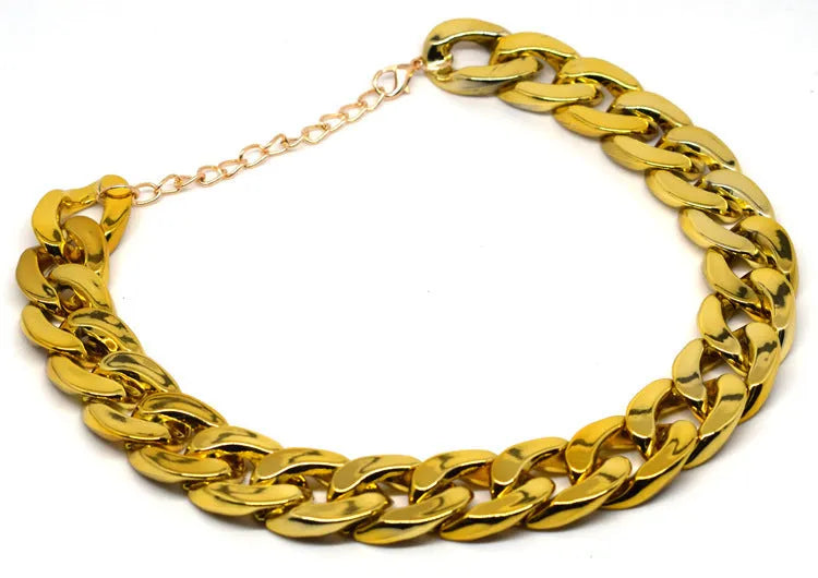Gold colour twisted chain dog collar with buckle fastener on a white background.