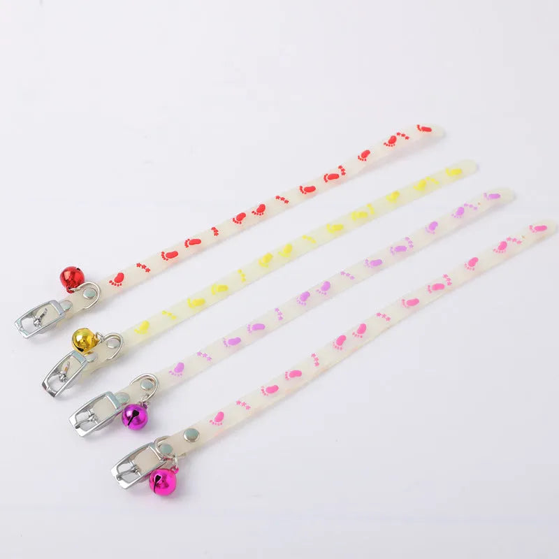 Luminous cat collar with adjustable silicone chain showing fishbone pattern design and metal bell