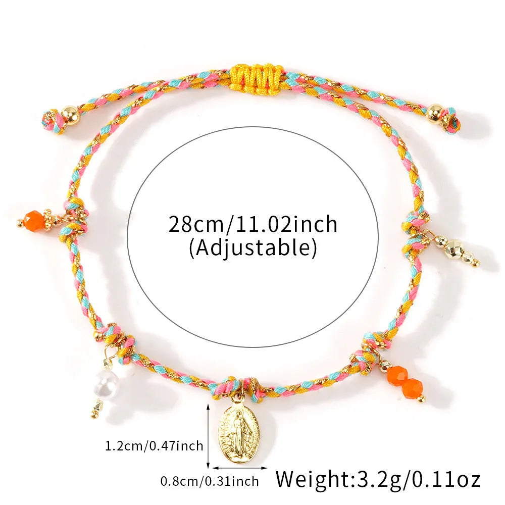 Close-up of a colourful hand-woven braided rope bracelet for women with an adjustable fabric strap tag.