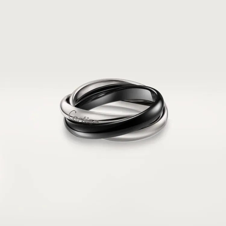 Geometric U-shaped sterling silver couple rings with diamond settings and engraving options on a ring size chart.