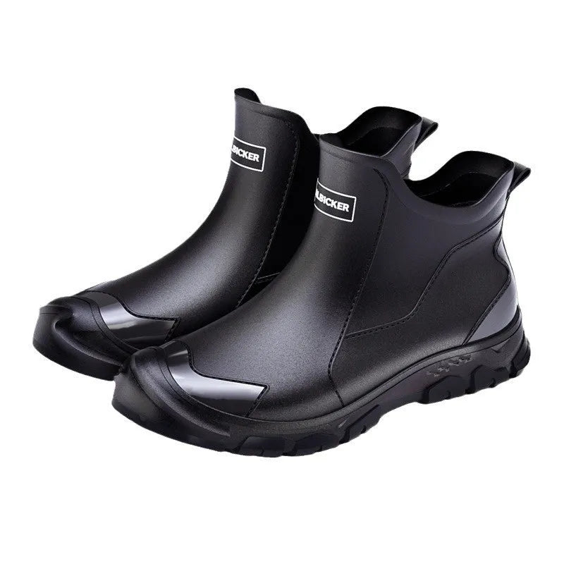 Short tube PVC wading shoes with a round toe and non-slip plastic sole on a flat heel.