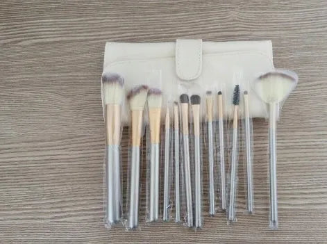Persian make-up brush set with rice white bristles and champagne handles in 12, 18, or 24 brush options.