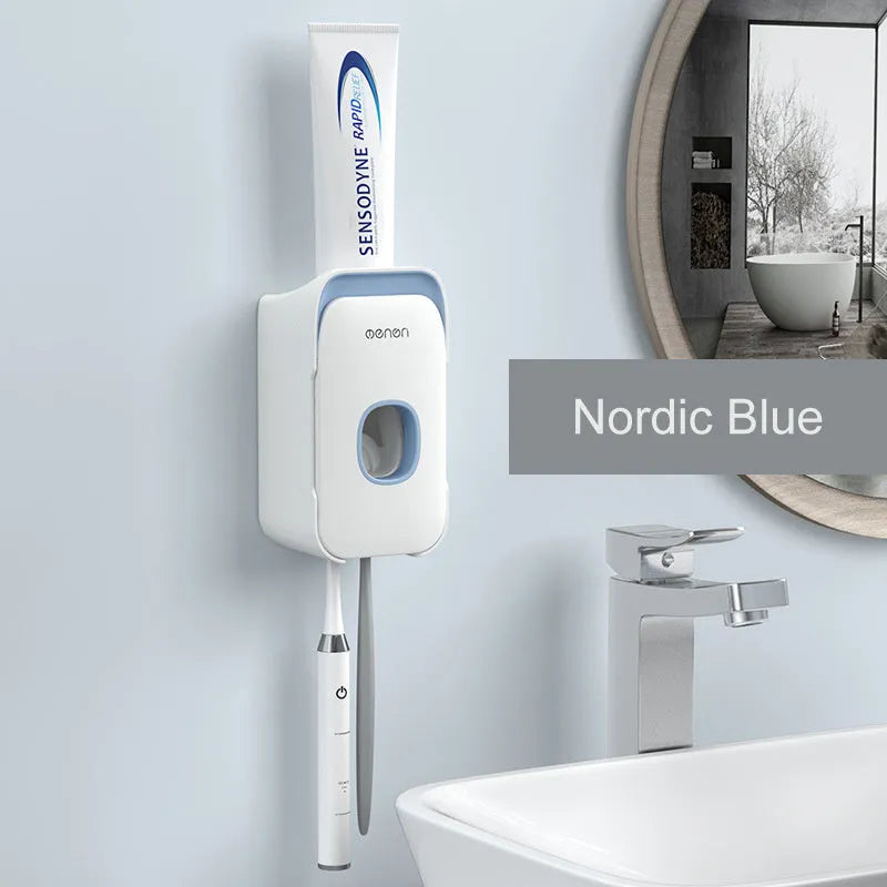 Wall-mounted automatic toothpaste dispenser in blue, grey, and pink colours