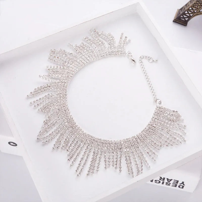Neck Elements alloy necklace with tassel diamond pendant on box chain in gold colour