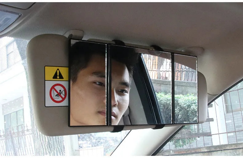 Silver car folding makeup mirror shown closed at 15.5cm wide and opened to 30.5cm wide