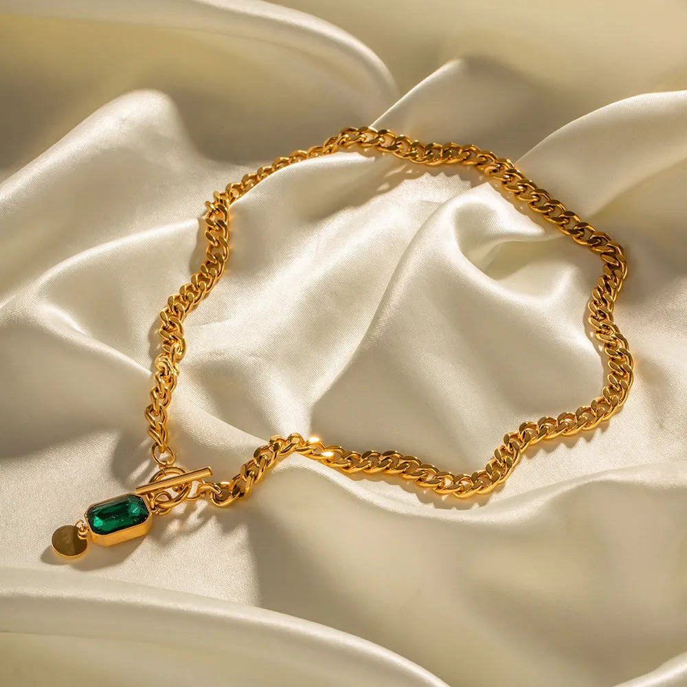Gold geometric emerald zircon pendant necklace on Cuban link chain