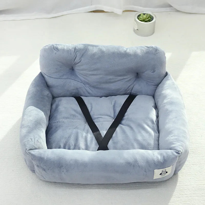 Car-mounted pet travel nest in grey and blue plaid colours showing stain-resistant cloth construction