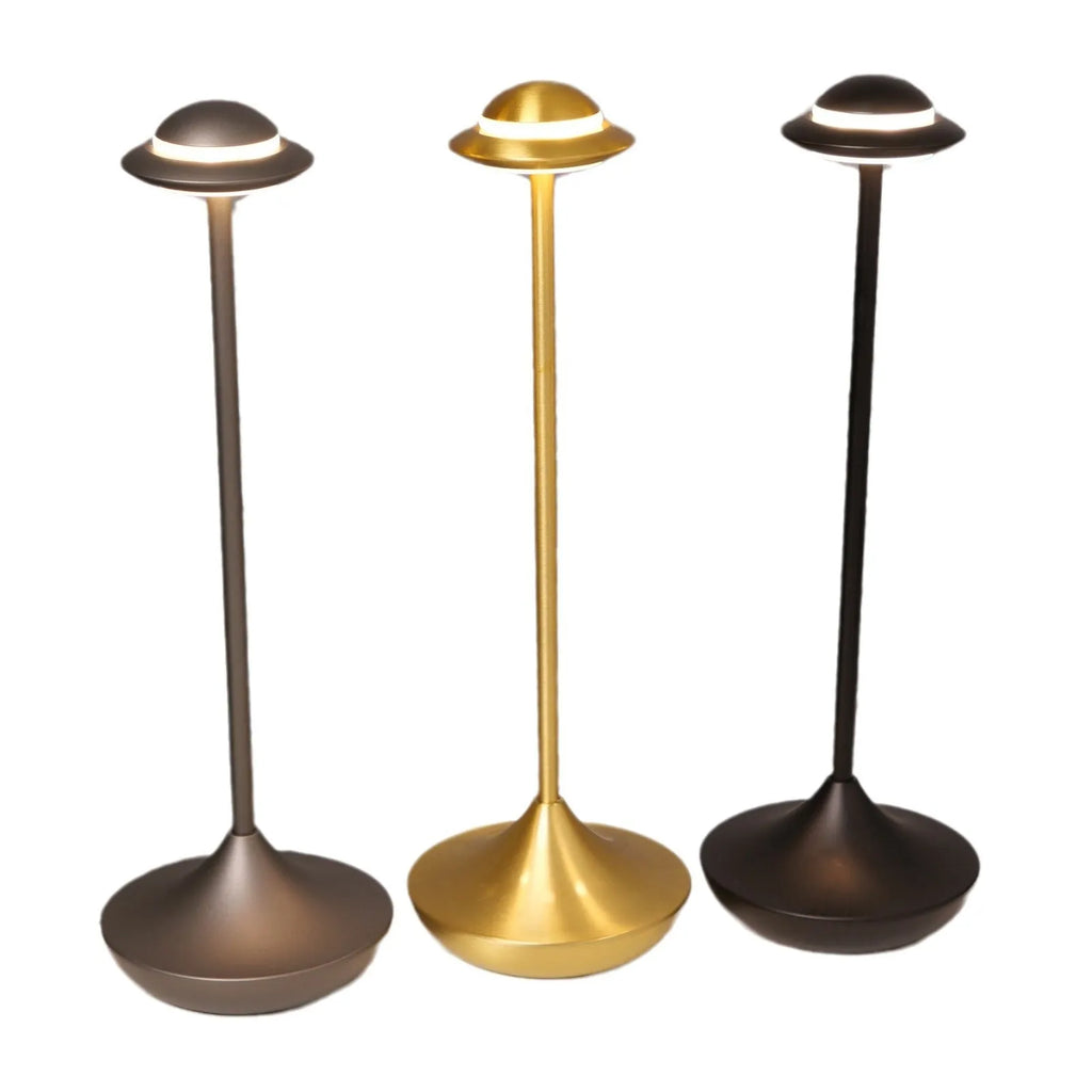 Creative UFO-shaped rechargeable table lamp with metal base in black, gold, or grey colour.