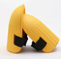 A pair of rectangular EVA foam knee pads in army green colour, shown with dimensions 19cm by 15cm.