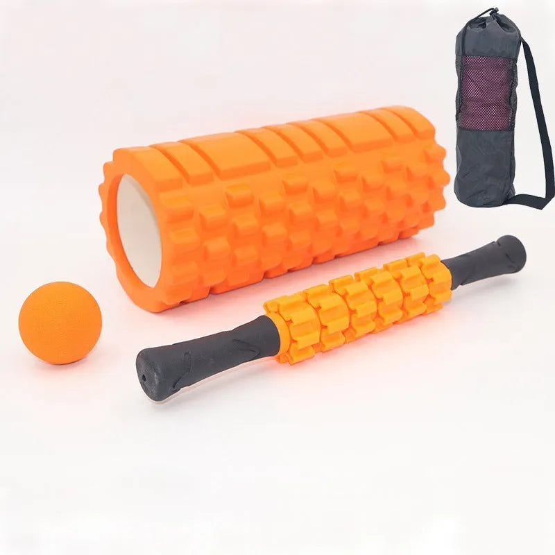 Black foam massage roller measuring 33cm with six separate massage pieces along shaft