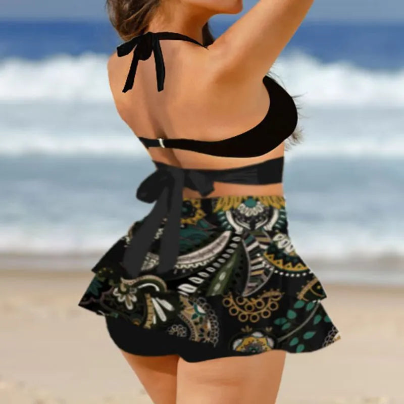 Women's purple high-waisted bikini swimsuit with lace-up detail and skirt