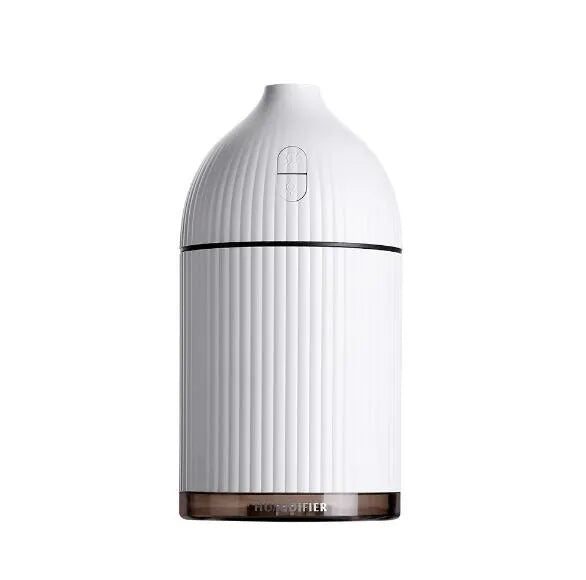 White ultrasonic aromatherapy diffuser and humidifier with LED light and 300ml capacity.