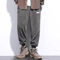 Men's grey casual sweatpants with ankle tie design and straight leg cut