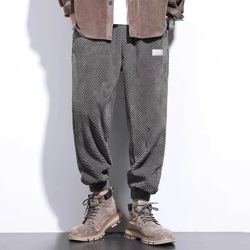 Men's grey casual sweatpants with ankle tie design and straight leg cut