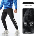 Men's black sweatpants with ankle ties shown mid-waist, featuring adjustable cuffs and casual sports styling