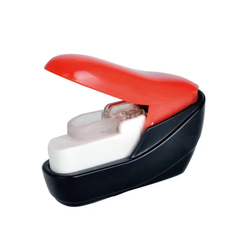 Compact stapler-free embossed paper binder in random colour on white background