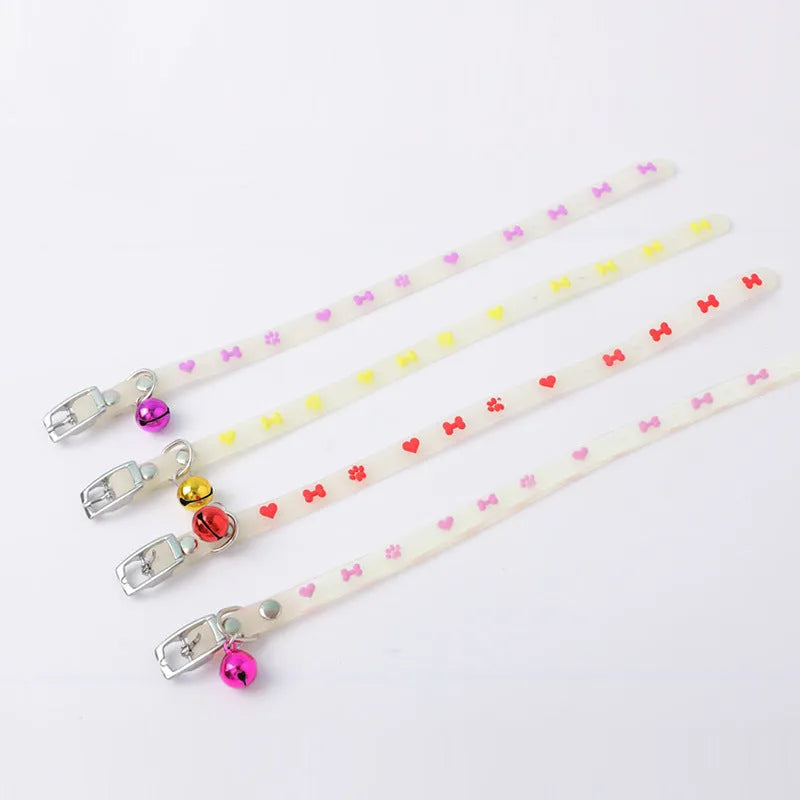 Luminous cat collar with adjustable silicone chain showing fishbone pattern design and metal bell