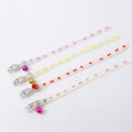 Luminous cat collar with adjustable silicone chain showing fishbone pattern design and metal bell
