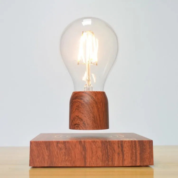 Magnetic levitation floating light bulb on an imitation wood base with multiple international plug options